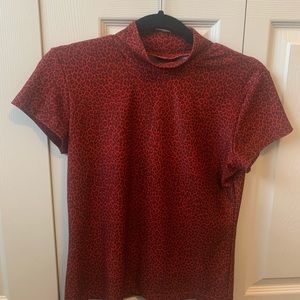 Red cheetah print turtleneck